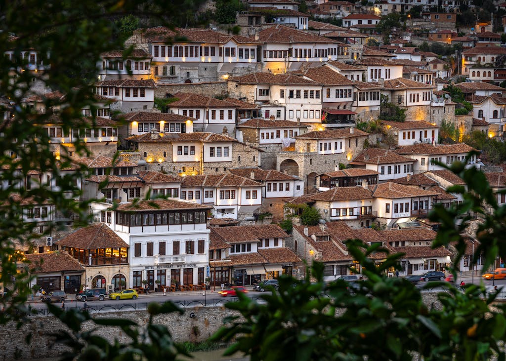 A view of a town at dusk with many buildings