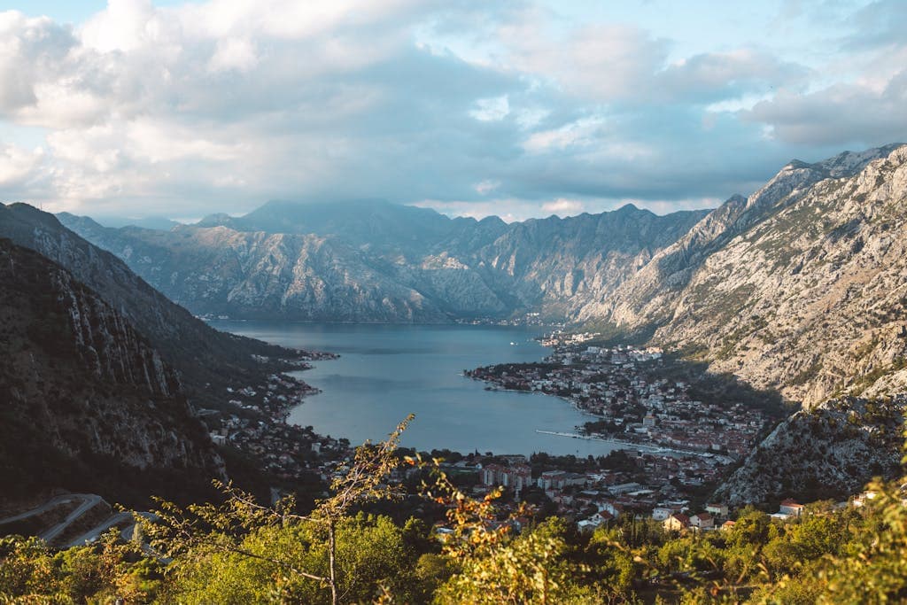 Scenic View of Lake and Mountains
