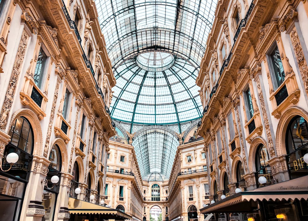 Stunning view inside the historic and luxurious Galleria Vittorio Emanuele II in Milano, Italy.